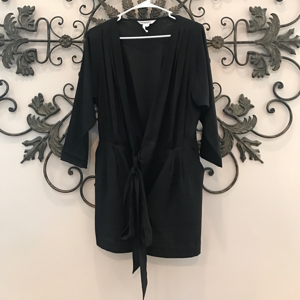 BCBGeneration wrap around black romper size 2